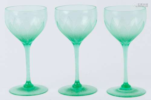 Three fine Art Nouveau green stem glasses with acid etched l...