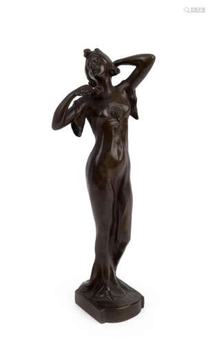 An antique French Art Nouveau statue of a lady, solid cast b...