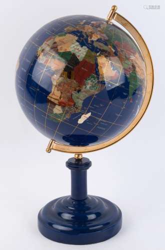 A Chinese globe of the world with inlaid semi-precious stone...
