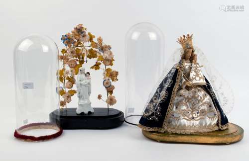 Two cylindrical French glass domes with Virgin Mary and baby...