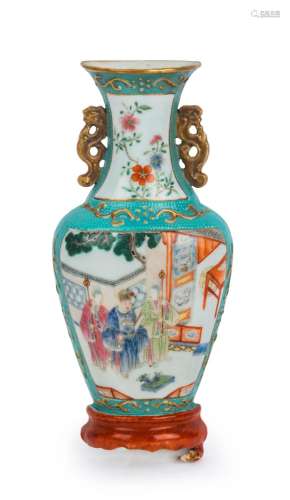An antique Chinese porcelain sedan chair wall vase with gilt...