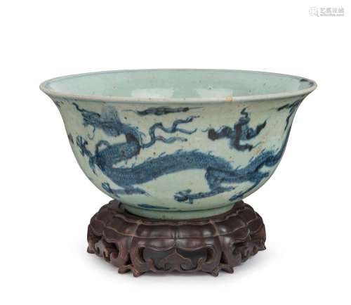 An antique Chinese porcelain bowl with underglaze phoenix de...