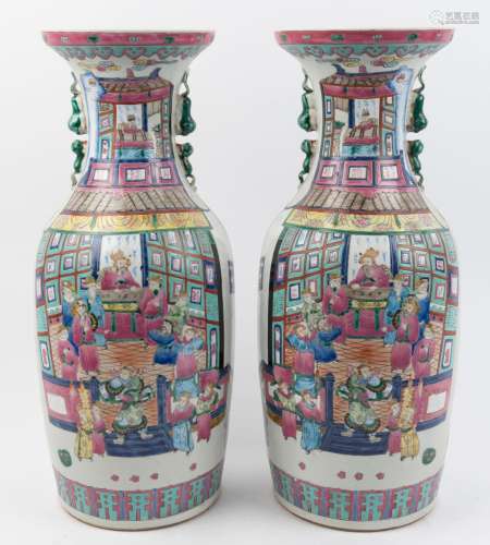 A pair of Chinese porcelain vases decorated in polychrome en...