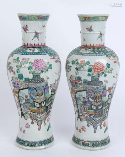 A pair of Chinese porcelain baluster shaped vases decorated ...