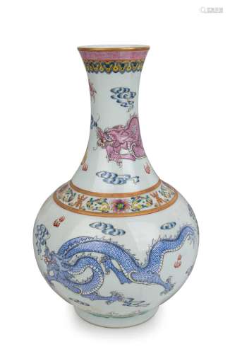 An impressive Chinese porcelain vase with three celestial dr...