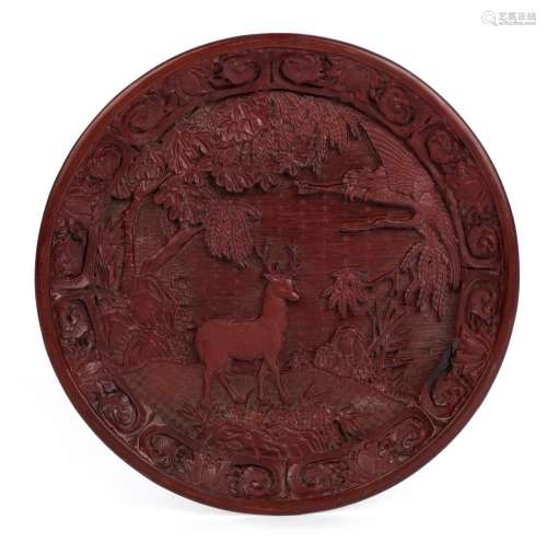 A Chinese carved cinnabar lacquered platter, Qing Dynasty, l...
