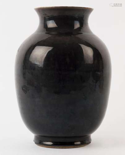 A Chinese porcelain vase with black glazed exterior, Qing Dy...