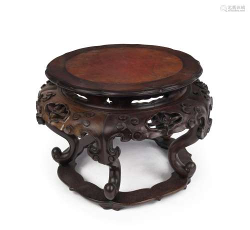 An outstanding Qing Dynasty Chinese carved wooden stand with...