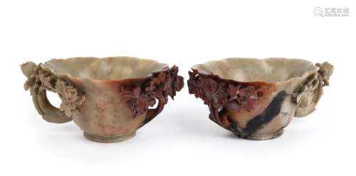 A pair antique Chinese libation cups, carved light green and...