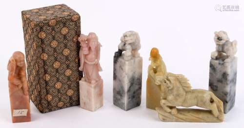 Six Chinese carved stone seals with carved finials, 19th and...