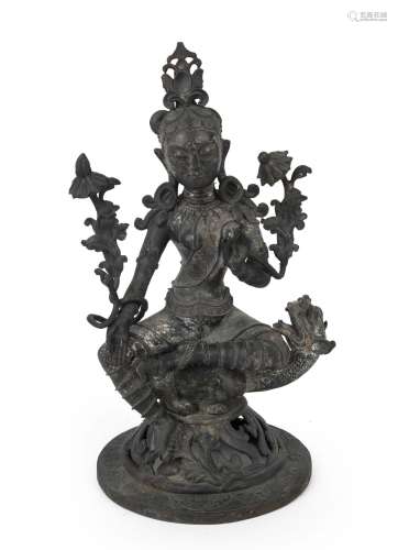 A Tibetan bronze seated Tara statue with dragon and  A simil...