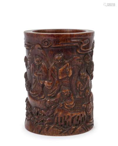 A Chinese carved horn brush pot with scene of Sages in a mou...