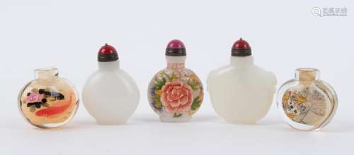 Five assorted Chinese snuff bottles including two white jade...