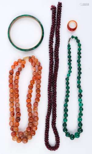 Three Chinese stone necklaces and a bangle, (4 items)