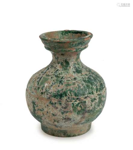 A Chinese earthenware pot with remains of green glaze, Han D...