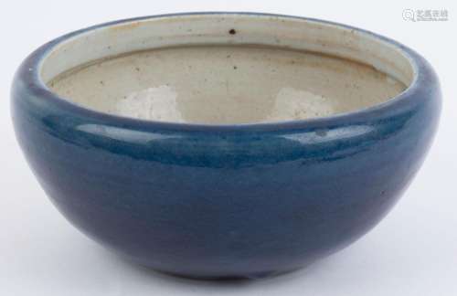 An antique Chinese ceramic brush pot with blue glaze, late M...