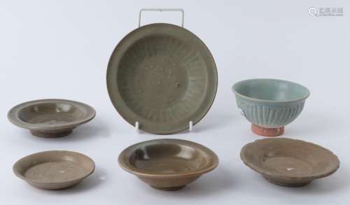 Six assorted antique Chinese celadon bowls and dishes, the l...