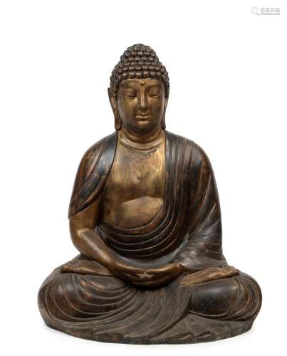 An antique Chinese cast bronze seated Buddha statue, late Qi...