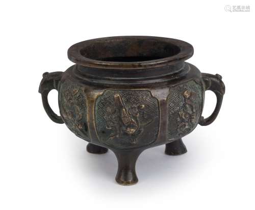 An antique Chinese bronze censer with elephant handles, Qing...