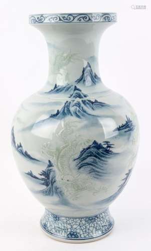A Chinese blue and white porcelain mantel vase with embossed...