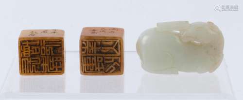 Two Chinese stone seals together with a carved jade animal o...