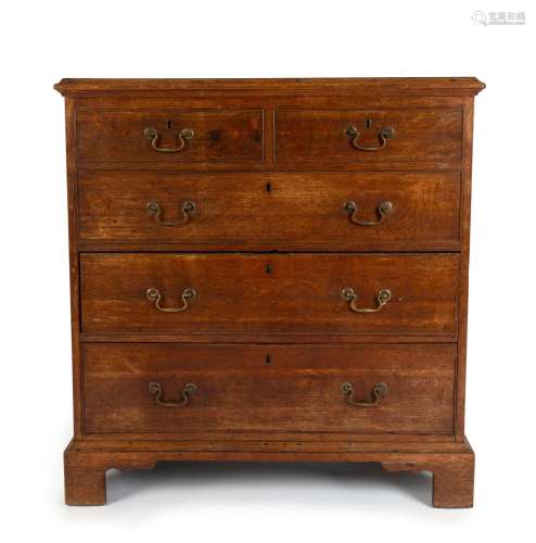 An antique English oak two drawer chest with blanket box lif...