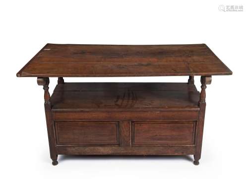 An antique English oak monk's table bench seat, 19th ce...