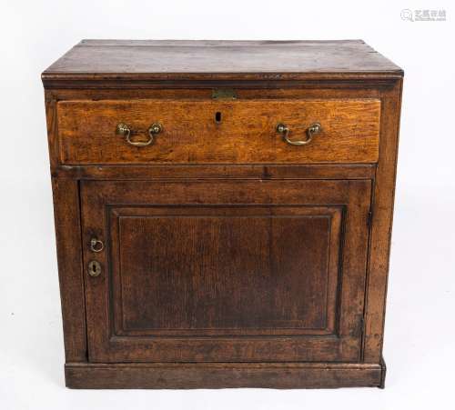 An antique English oak cabinet with single door and drawer, ...