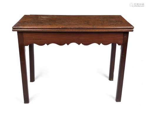 A Georgian mahogany fold-over tea table, late 18th century, ...