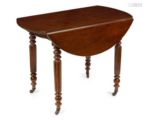 An antique English mahogany drop-side occasional table with ...