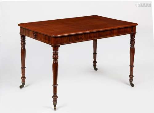 An antique English mahogany desk with fine ring turned legs ...