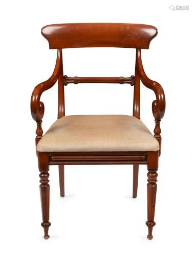 An English mahogany spade back carver chair with tapering he...