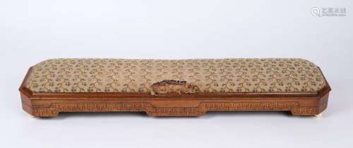An antique English walnut footstool with geometric marquetry...