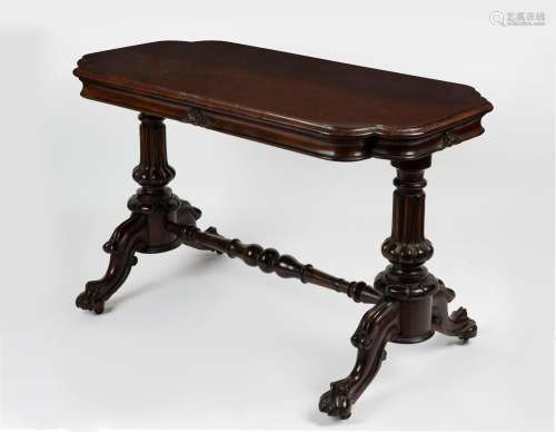An antique English walnut occasional table, circa 1885, with...