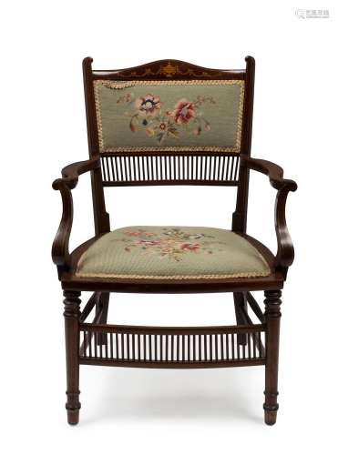 An antique English parlour chair, mahogany with marquetry in...