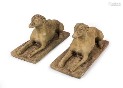 A pair of antique composition stone reclining greyhound gard...