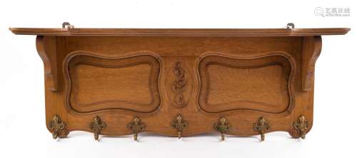 An antique French oak wall mounted coat rack, late 19th cent...