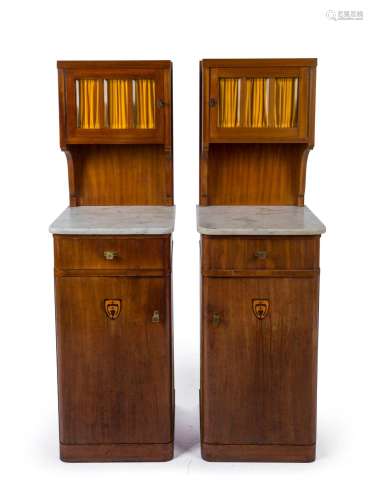 A pair of Austrian Secessionist bedside cabinets, mahogany a...
