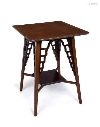 An antique Japanese inspired mahogany occasional table, earl...