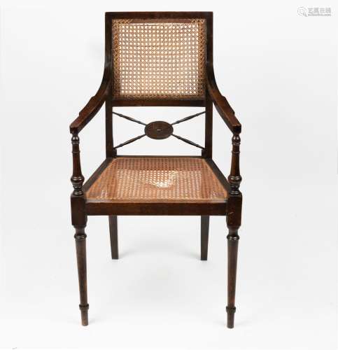 An English walnut armchair with cane seat, early 20th centur...