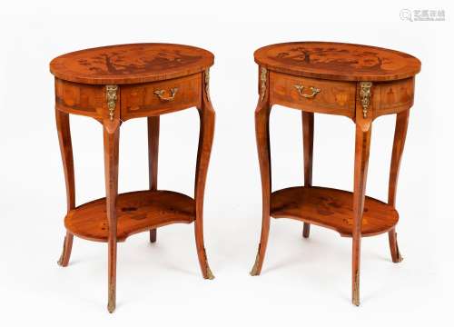 A pair of French reproduction oval bedside tables, marquetry...