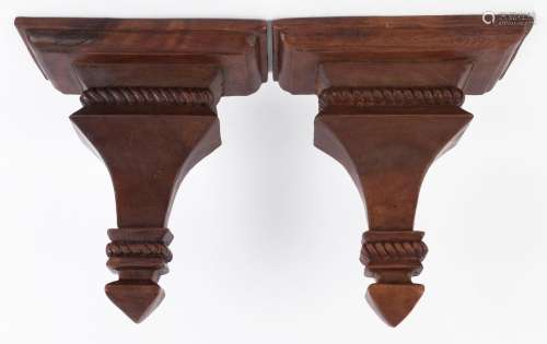 A pair of carved timber corbel wall brackets, 20th century, ...