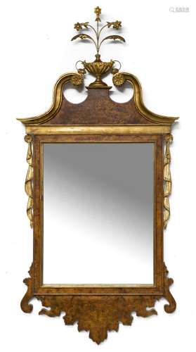 An Italian timber framed mirror with gilt decorated highligh...