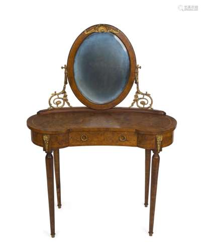 A French kidney shaped dressing table, burr elm with kingwoo...
