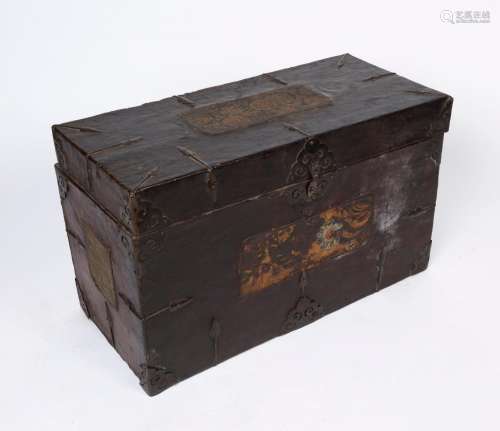A Chinese lift-top trunk, leather finish with cloth panels a...