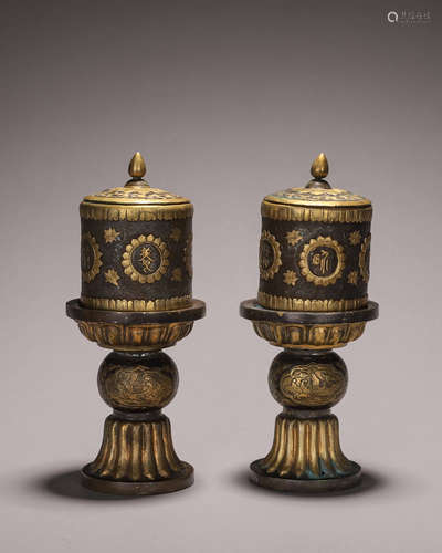 A pair of gilding copper candlesticks