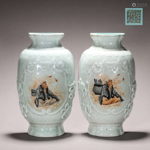 A pair of celadon glazed arhat porcelain vases