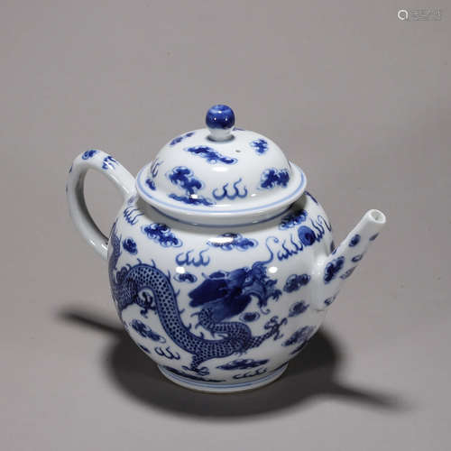 A blue and white cloud and dragon porcelain teapot