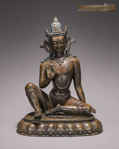 A silver-inlaid copper Guanyin bodhisattva statue