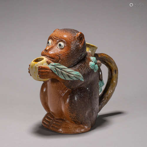 A monkey shaped porcelain teapot